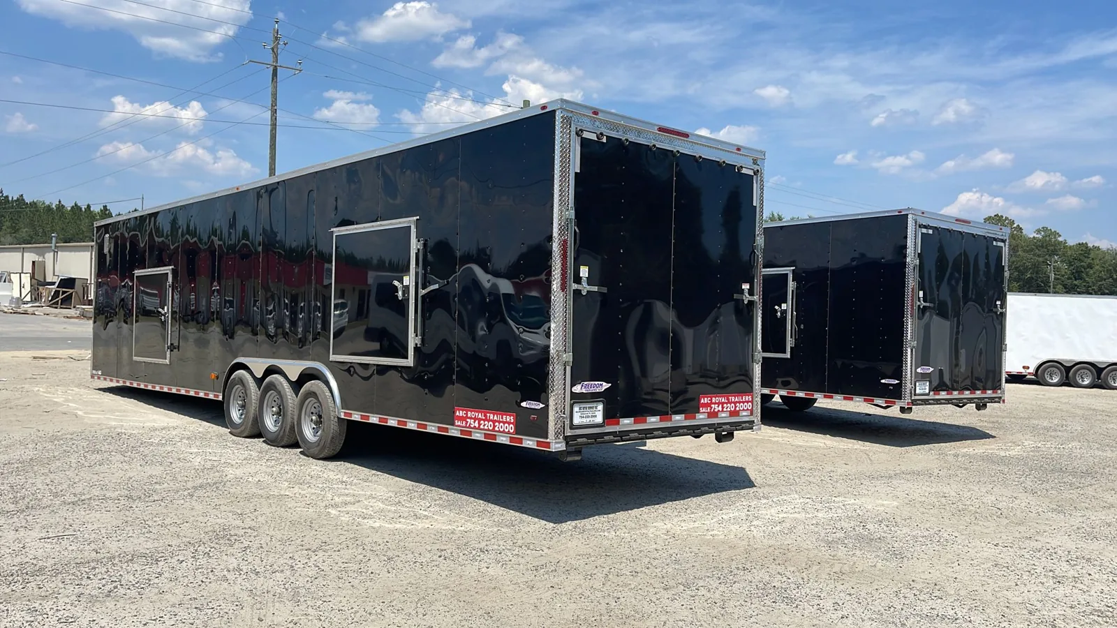 White enclosed cargo trailer at the factory yard
